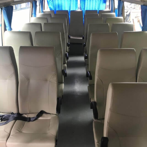 Coaster bus seating capacity